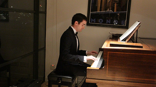 Alex performing at the Spring 2015 Secret agent concert at the London Piano Institute