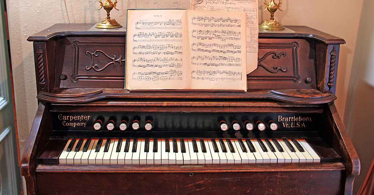 An old piano with music sheet