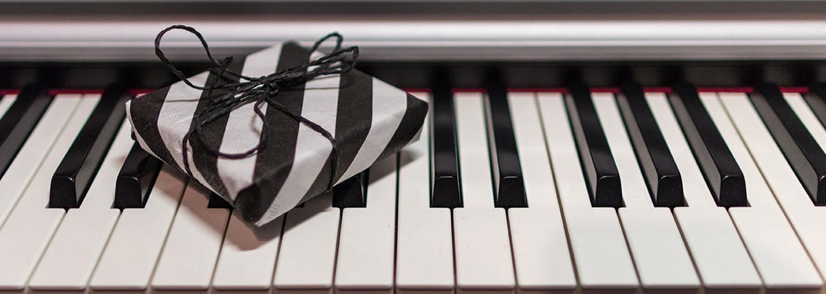 Black and white stripe gift on piano