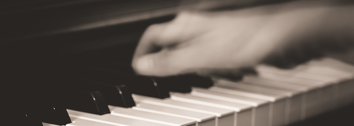 blurred hand on the piano