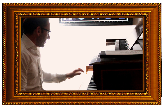 Christian playing the piano in the Autumn concert in 2014
