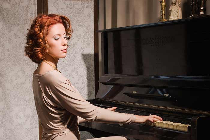 classic-woman-playing-the-piano-feat