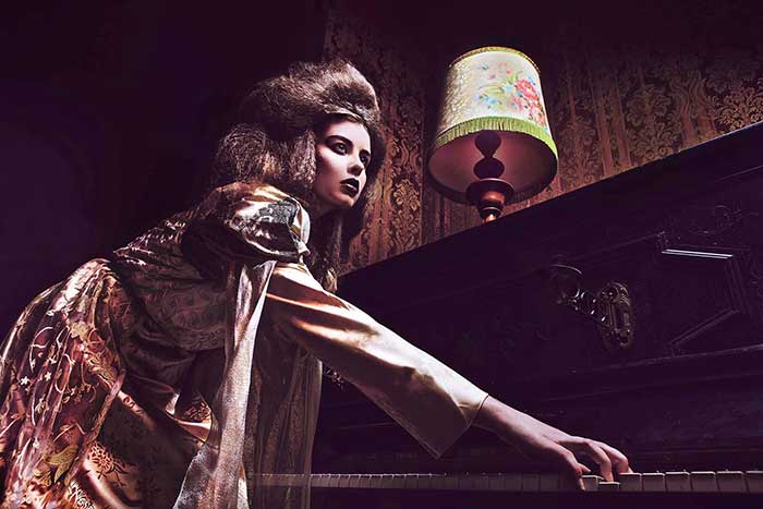 Fashionable star playing the piano