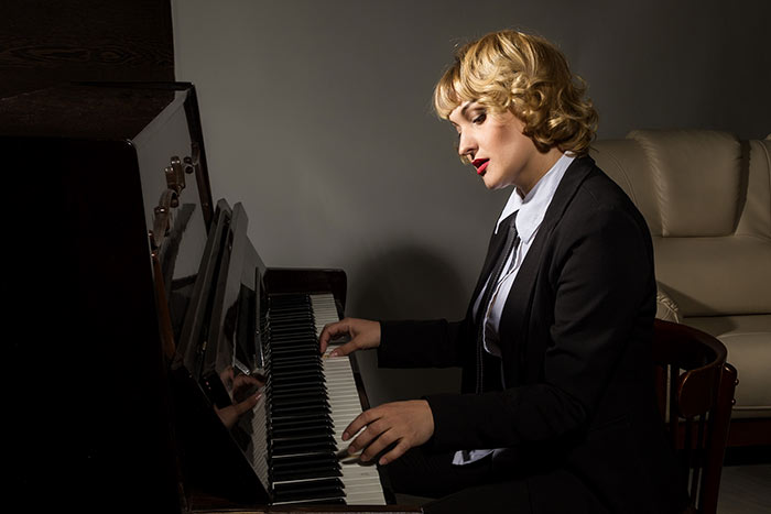 female pianist practising feat