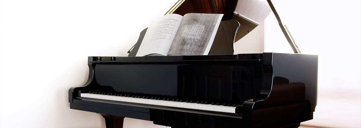 Grand piano with music book