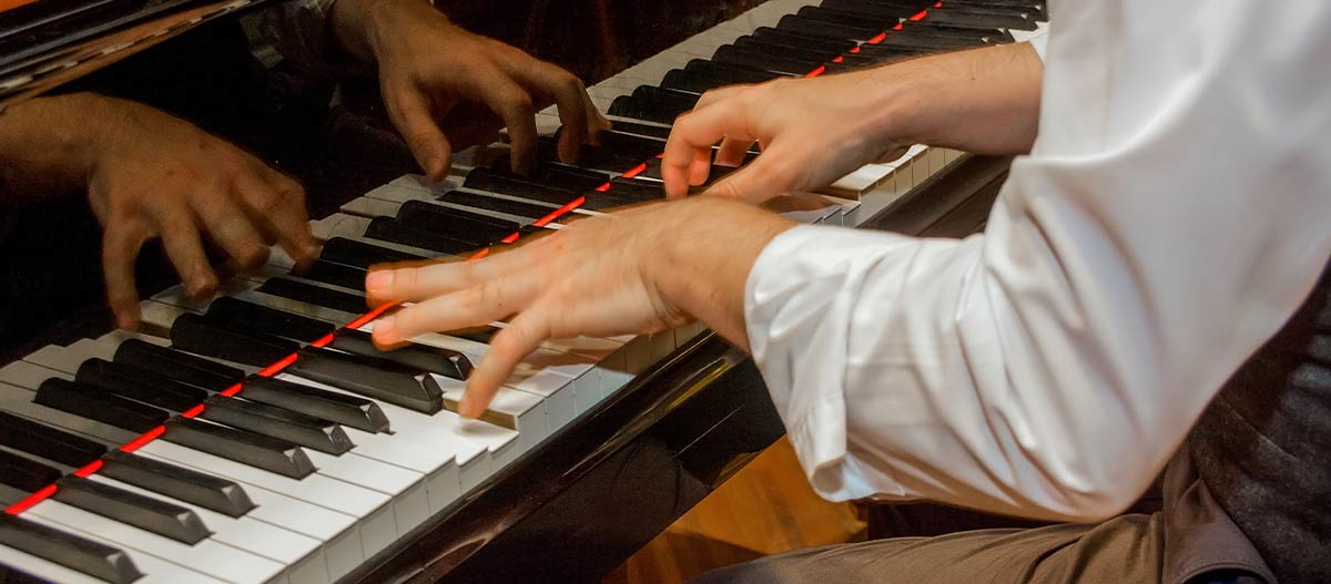 Hands on piano