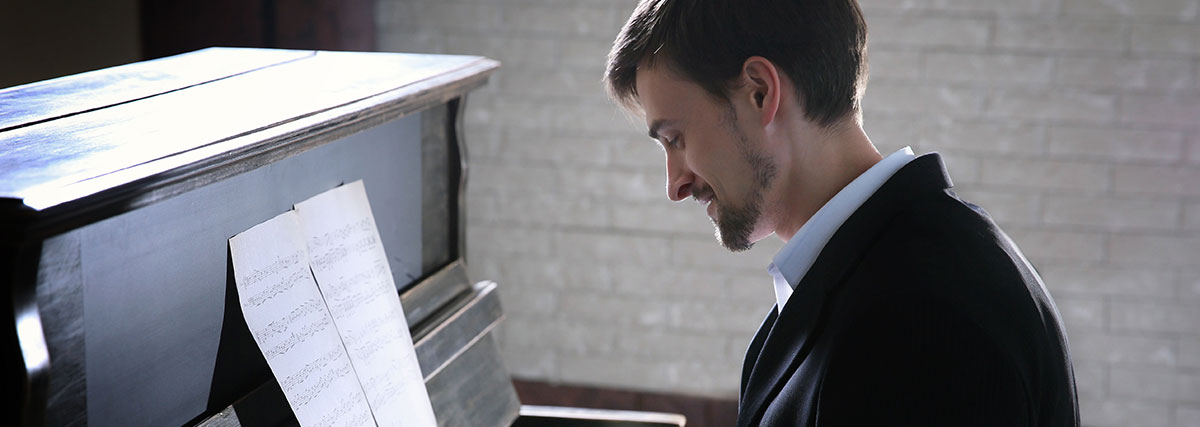 Gentleman playing a piece of music with emotion and enjoying himself!