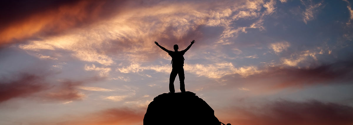 man on thp of the hill