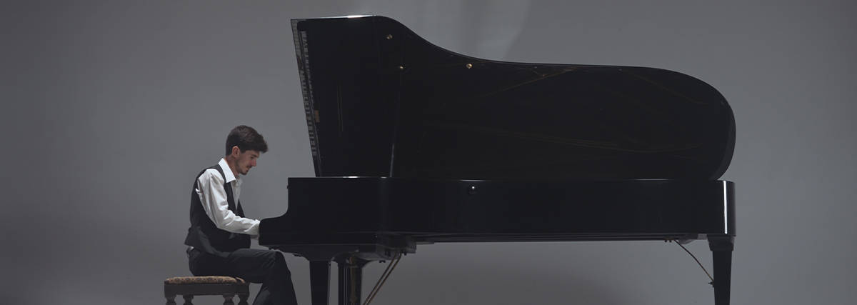 Man playing the grand piano