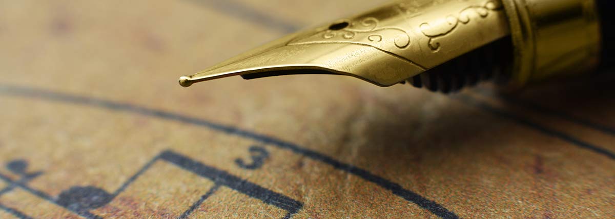 music score and luxurious writing pen