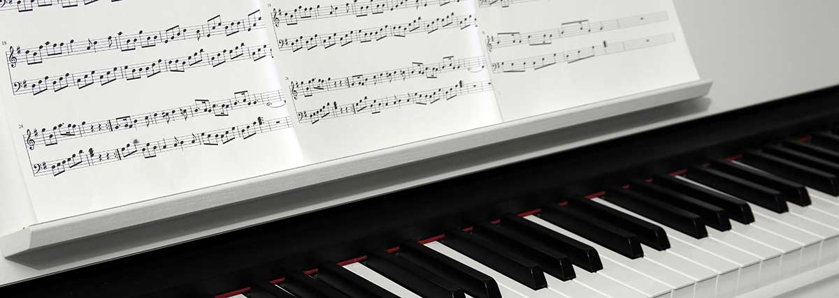 music sheet on the piano