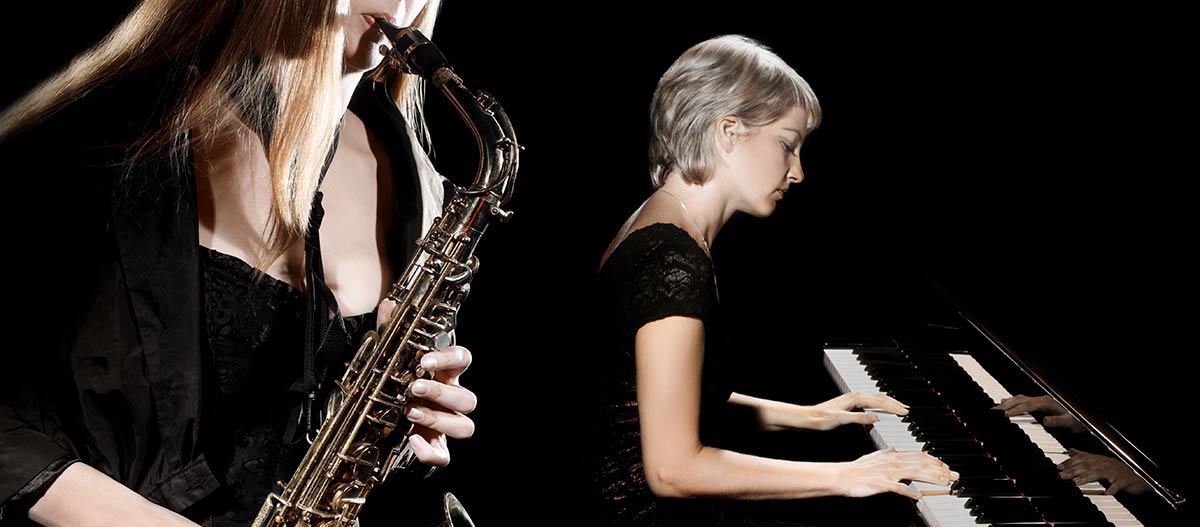 Pianist and saxophonist performing together