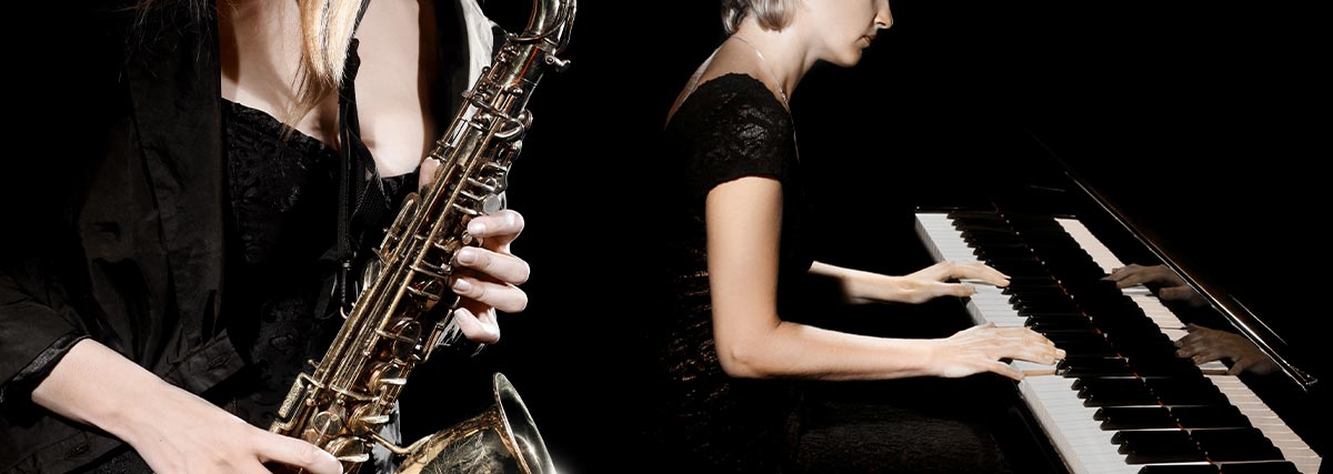 Pianist and saxophonist playing together