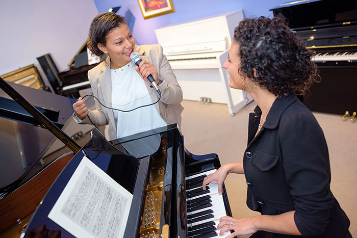 Pianist and singer performing together