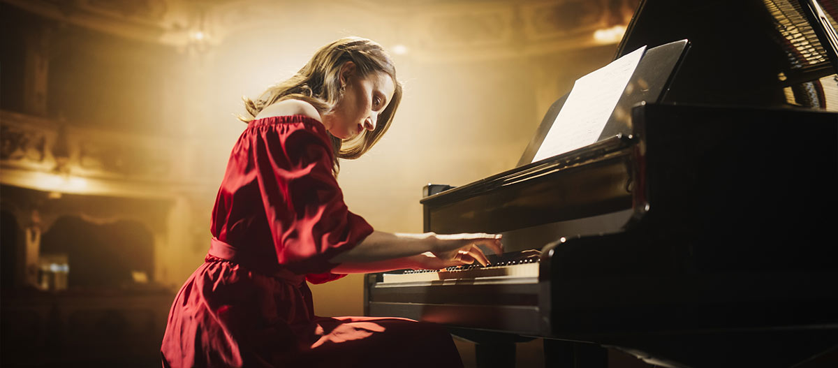 Professional pianist performing passionately