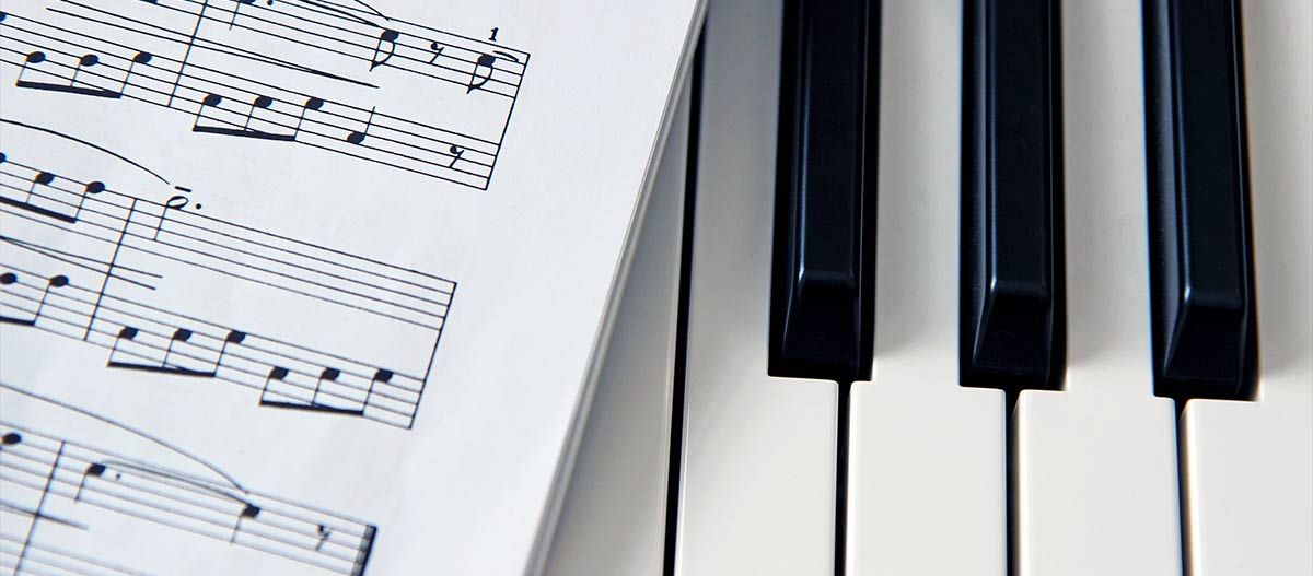 Sheet music on piano