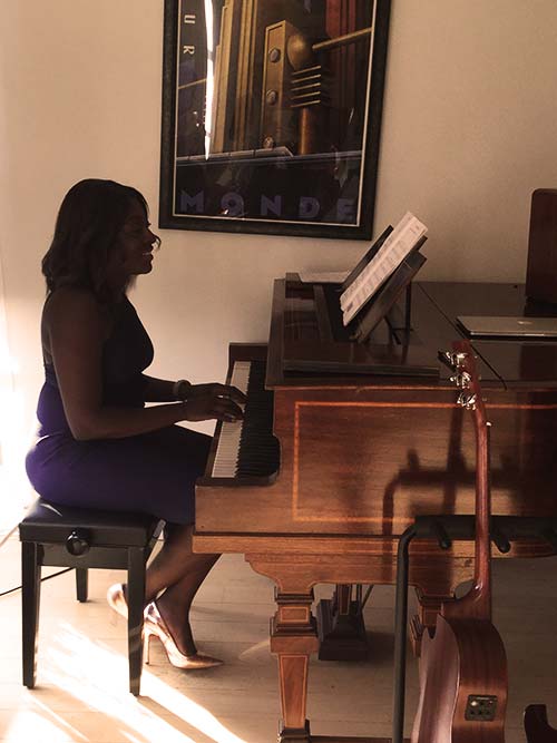Tasha performing the piano