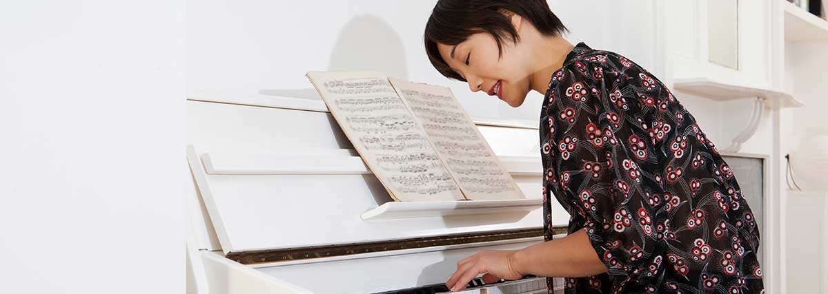 woman concentrating on her playing