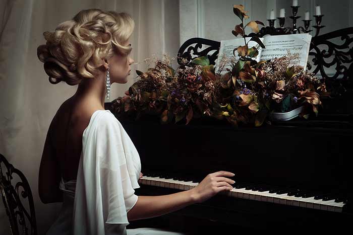 woman-in-white-playing-the-piano-feat