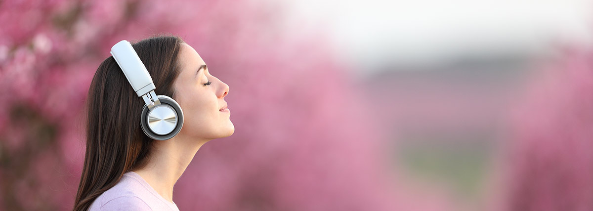 woman listening to relaxing music