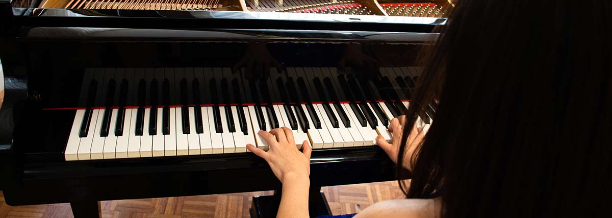 woman playing the piano