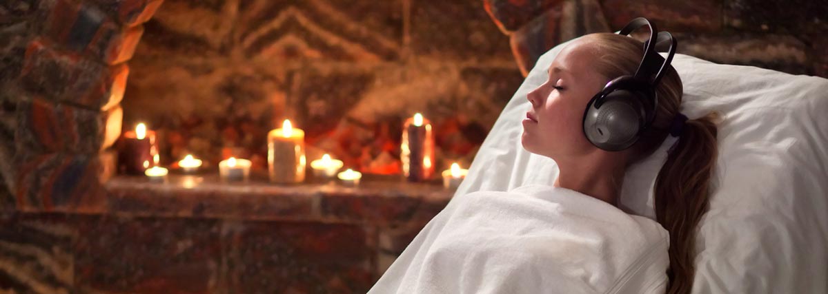 woman relaxing to music